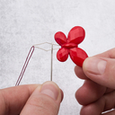 Нитковдеватель 